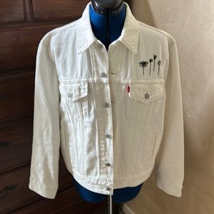 Levi’s white denim jeans jacket with black embroidered flowers.